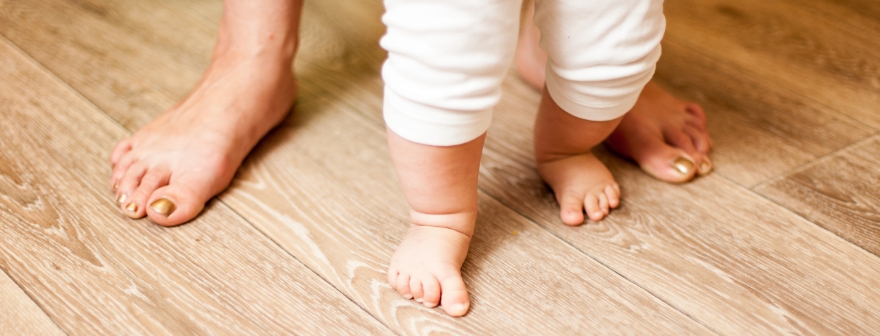 Photo of baby's feet and floor
